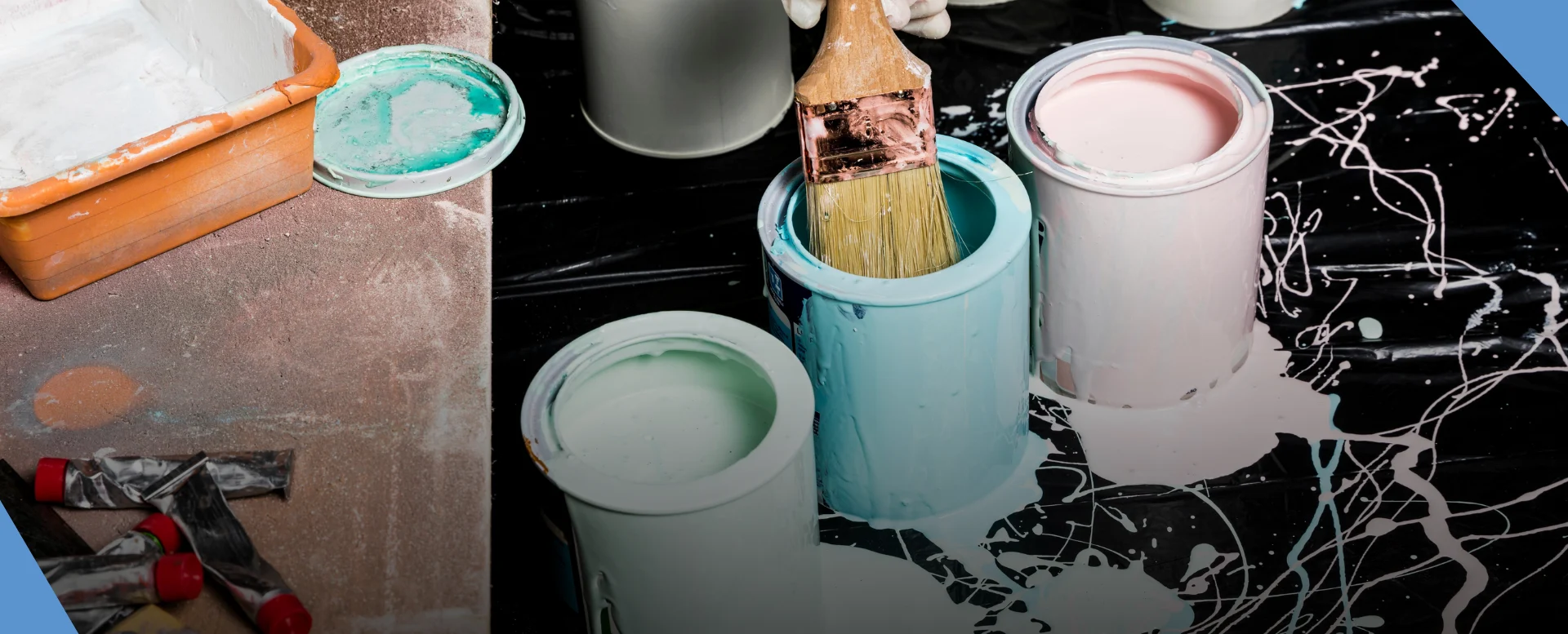 Painting and decorating a rendered house wall in South West London